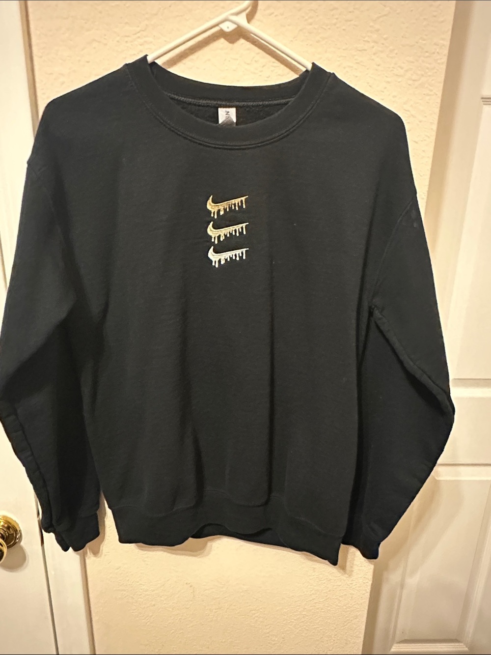 Women's Black Crewneck Sweatshirt with Dripping Nike Logos